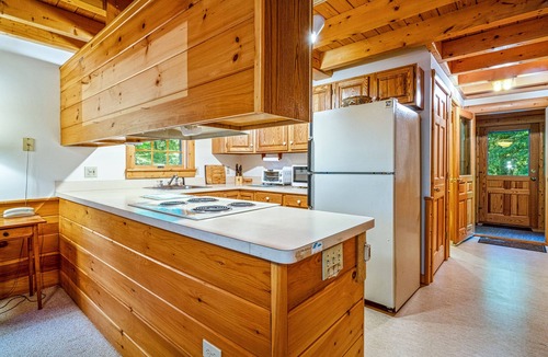 Center Harbor House | Charming lakefront cabin with private dock, deck & screened porch