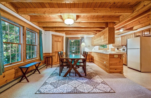 Center Harbor House | Charming lakefront cabin with private dock, deck & screened porch