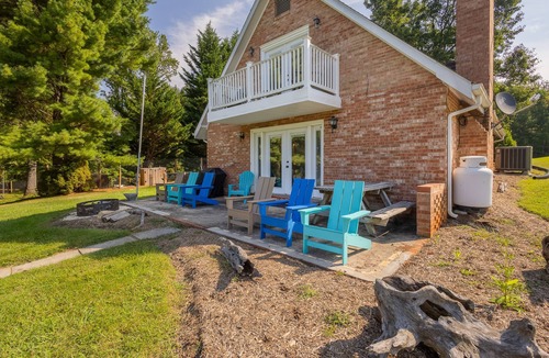 Ingles House | Charming lakefront retreat with cozy interiors, private dock, fire pit, and breathtaking water view