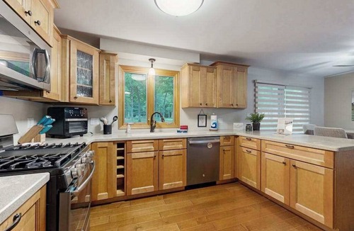Arbor Vitae House | Charming Lakefront home w/dock, gas grill, fire pit, on ATV/Snowmobile trail