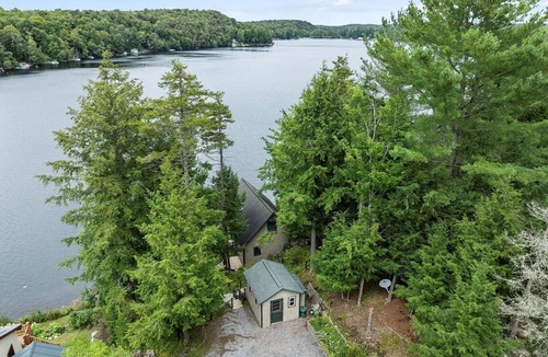 Woodgate House | Charming Lakeside Little Evergreen Cottage on White Lake