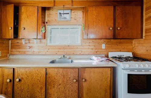 Lakefield House | Charming Lakeview Family Resort in Katchwanooka with Private BBQ and firepit