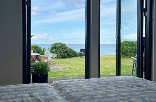 Nyborg House | Charming little summer house right by the water