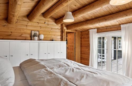 Bøtø By House | Charming Log Cabin Near The Sea