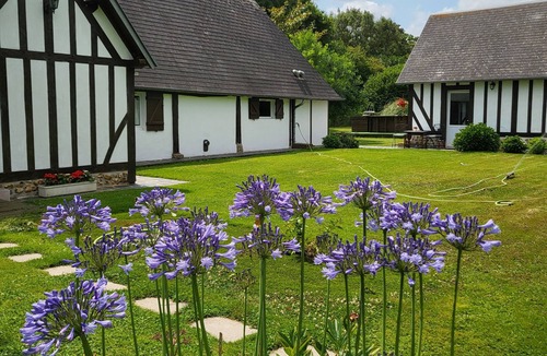 La Roussiere Cabin | Charming Normandy-style guest cottage, pets welcome, enclosed grounds