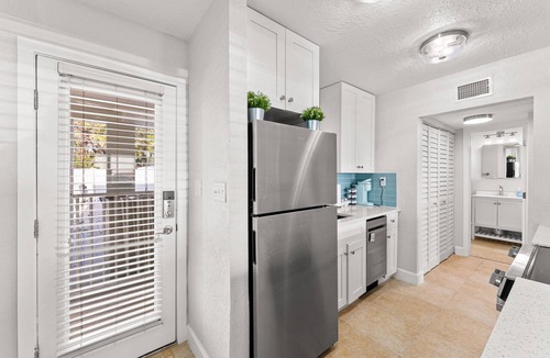 Pass-a-Grille Historic District Condo | Charming Pass-a-Grille beachfront condo, St. Pete Beach, heated pool, laundry