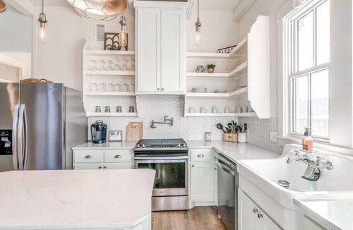 Carlton Landing House | Charming Pink House! Steps to Boardwalk Pool!