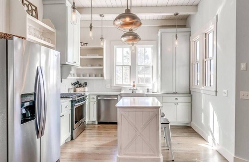 Carlton Landing House | Charming Pink House! Steps to Boardwalk Pool!