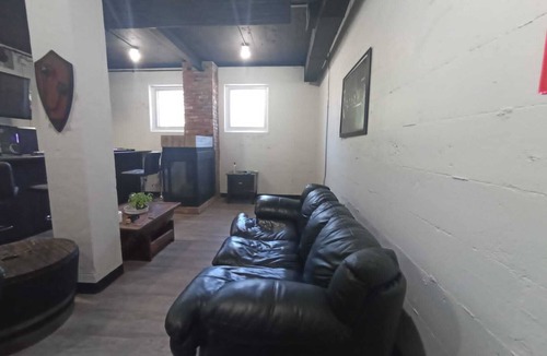 Sault Ste. Marie Apartment | Charming Prohibition-Era Speakeasy Lounge with Bedroom and Commercial Kitchen