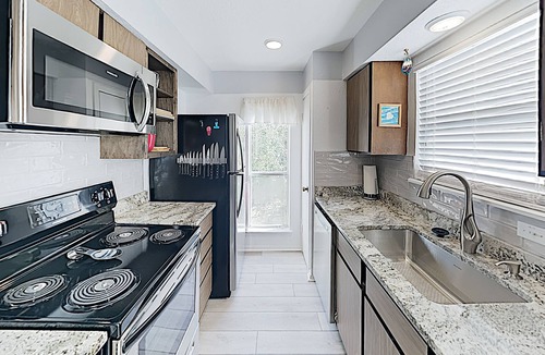Sailhouse Condo | Charming Remodeled Condo w/ Pool, Pier & Private Balcony