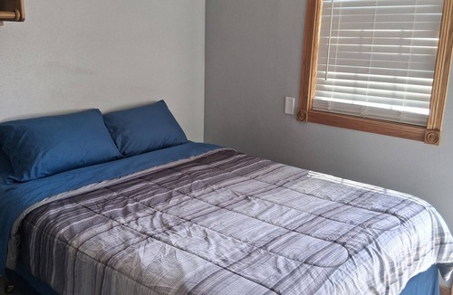 Hemphill Hotel | Charming remodeled motel room in Hemphill with Wi-Fi, mini fridge & microwave.