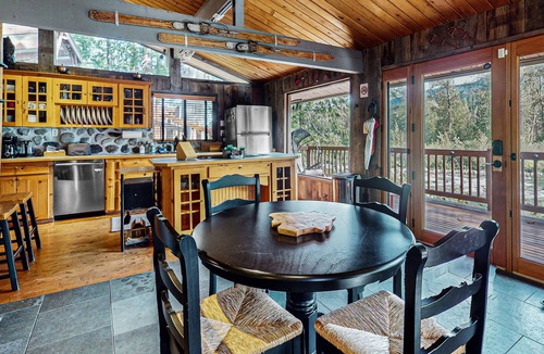 Gold Bar House | Charming riverfront cabin with hot tub, deck, mountain views and W/D