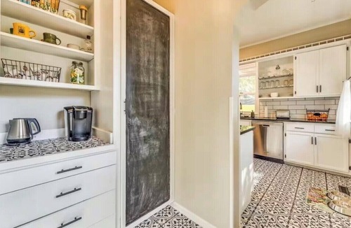 Wichita House | Charming Riverside Bungalow Park Access Pet-Friendly