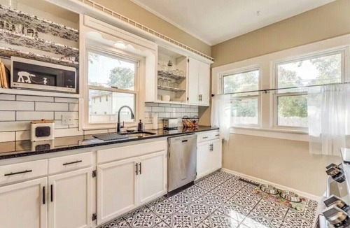 Wichita House | Charming Riverside Bungalow Park Access Pet-Friendly