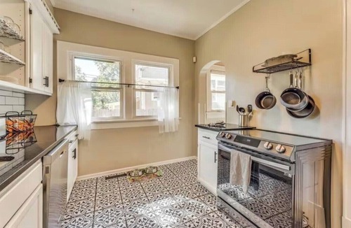 Wichita House | Charming Riverside Bungalow Park Access Pet-Friendly