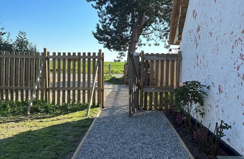 Nakskov House | Charming summer house with thatched roof and large garden. Pet friendly!