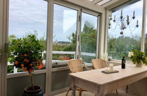 Randers Apartment | Charming sunroom with panorama view