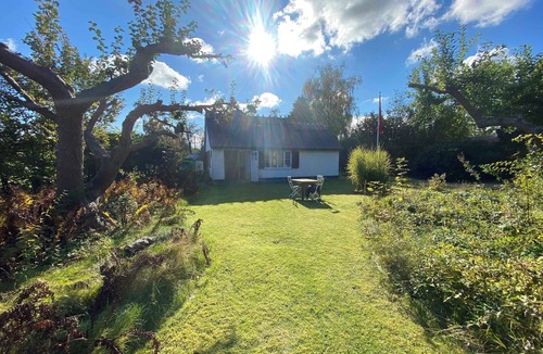 Dronningmolle House | Charming thatched-roof cottage from 1947
