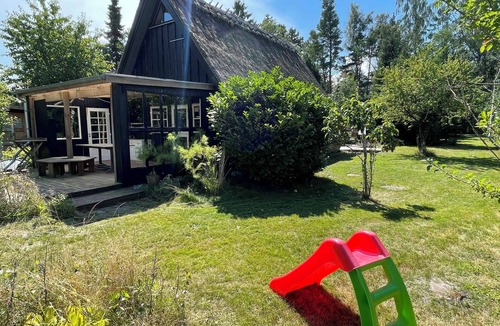 Skaverup House | Charming thatched cottage near the water