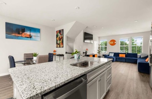 Portsmouth House | Charming townhome with prime location, upscale amenities, & personalized service