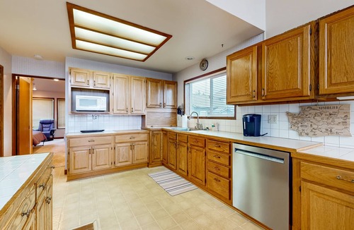 Bow Apartment | Charming waterfront cabin with expansive decks, and direct beach access