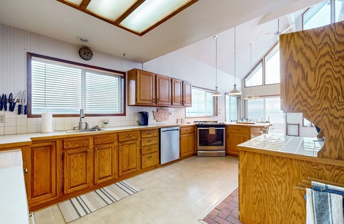 Bow Apartment | Charming waterfront cabin with expansive decks, and direct beach access