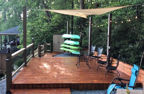 Moneta House | Charming Waterfront Home with Sunset Views & Deep Water on Wide Cove.