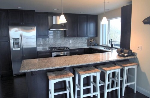 Poulsbo House | Charmingly Elegant High Bank Waterfront Home