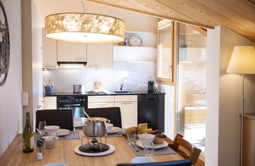 Engadin Scoul Apartment | Chasa Bagnera 174: modern 3 1/2 -room attic apartment right next to the Engadin Bad Scuol