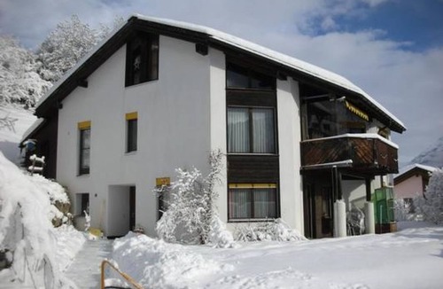 Engadin Scoul Apartment | Chasa Bainvgnü, (Scuol). by Interhome