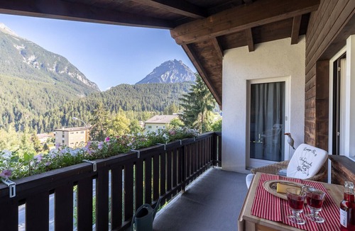 Engadin Scoul Apartment | Chasa Buorcha: Renovated, exceptional 1.5-room penthouse with large panoramic balcony