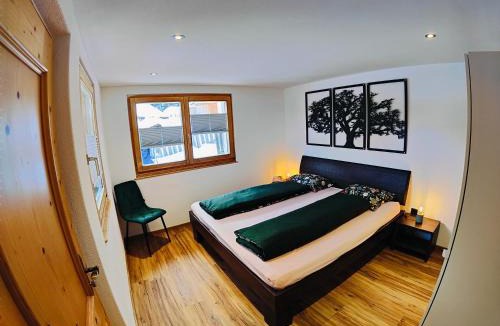 Ravaisch Apartment | Chasa Salnuun Ferienwohnungen