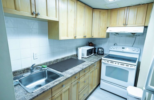 Southeast Calgary House | Cheerful 2 bedroom townhome with fireplace