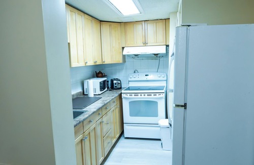 Southeast Calgary House | Cheerful 2 bedroom townhome with fireplace