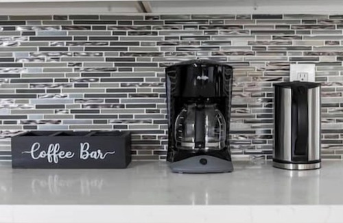 Kent House | Cheerful 3 bedroom home with ample parking spaces.