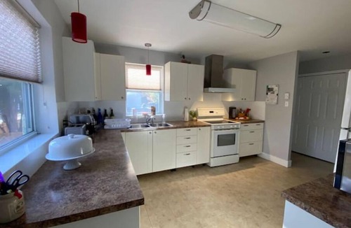 Deux-Montagnes House | Cheerful home on large lot near lake and Montreal