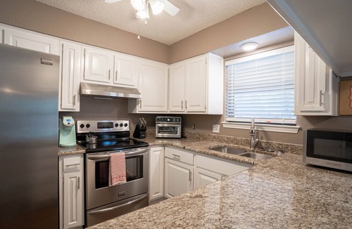 Crowley House | Cheerful Home w/Private Hot Tub, Big Fenced Yard, & Pool. Pet Friendly!