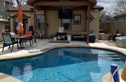 Southside House | Cheerful oasis home with pool and hot tub. 2.5 miles from downtown.