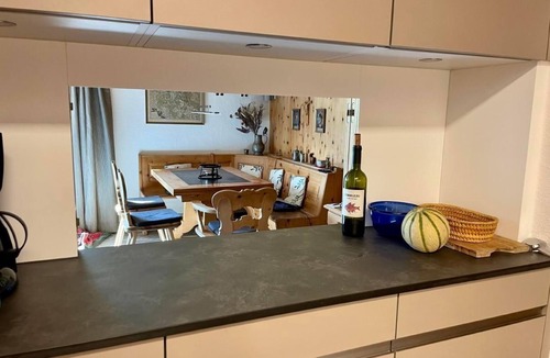 Zuoz Apartment | Chesa Sur En with a view of Piz Mezzaun and Uter