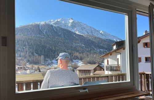 Zuoz Apartment | Chesa Sur En with a view of Piz Mezzaun and Uter