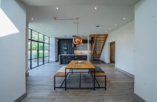 Sutton House | Cheshire Barn. views, bbq, fire pit, TV, Wifi