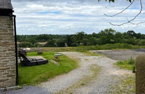 Sutton House | Cheshire Barn. views, bbq, fire pit, TV, Wifi