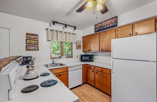 Great Cacapon House | Chesnutt Cabin - riverfront, fire pit, fireplace, game room, king bed