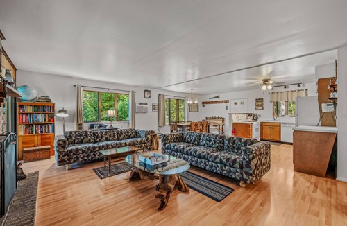 Great Cacapon House | Chesnutt Cabin - riverfront, fire pit, fireplace, game room, king bed
