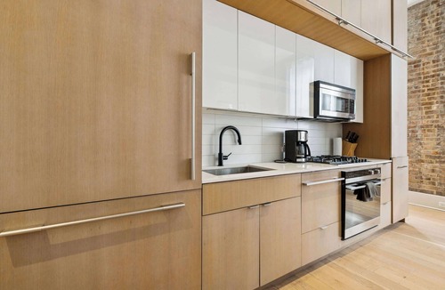 Tulane - Gravier Apartment | Chic 1BR in Historic School House | Gated Parking Included