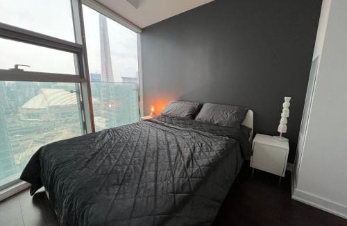 Toronto Entertainment District Apartment | Chic 2 Bedroom 2 Bathroom Panoramic CN Tower Views Condo With Free Parking