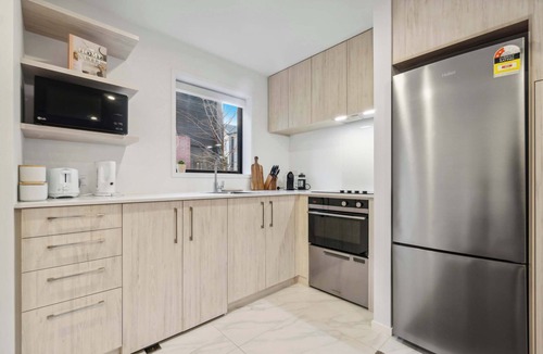 Henderson House | Chic 2-BR Haven with Relaxing Patio and Modern