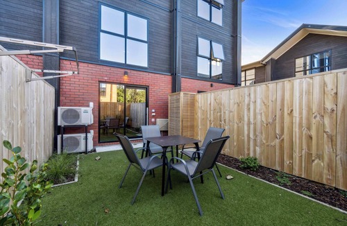 Henderson House | Chic 2-BR Haven with Relaxing Patio and Modern