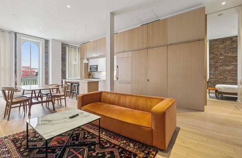Tulane - Gravier Apartment | Chic 2BR in Historic Schoolhouse w/Private Balcony and Gated Parking