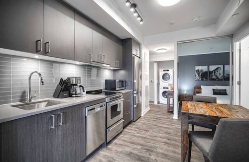 Bay Cloverhill Apartment | Chic 2BR Oasis with Skyline Views near Berczy Park